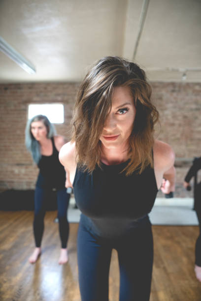istock Women Doing Dumbbell Barre Workout 831832710