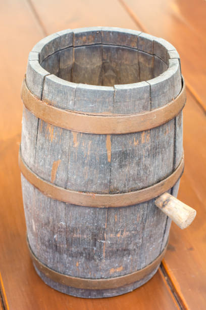 istock Ancient wooden barrel for beer on the table 831833440