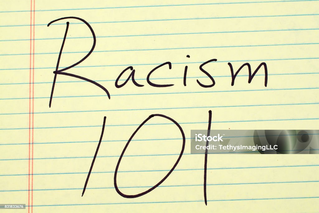 Racism 101 On A Yellow Legal Pad The words "Racism 101" on a yellow legal pad Racism Stock Photo