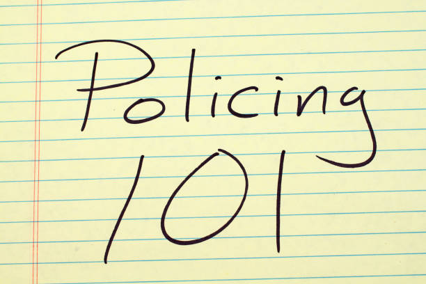 istock Policing 101 On A Yellow Legal Pad 831833738