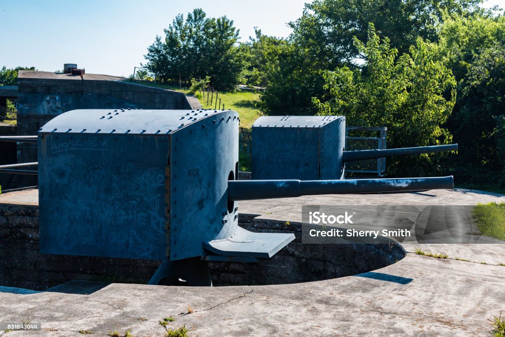 Two Endicott-Era Rapid-Fire Guns at Fort Monroe Side view of two Endicott-era, 3-inch, rapid-fire guns at Fort Monroe in Hampton, Virginia.  This was a 2-story battery with 4 guns mounted on the upper level at Battery Irwin. Ancient Stock Photo