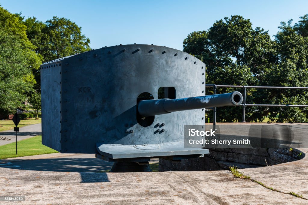 Antique Endicott-Era Rapid Fire Gun at Fort Monroe Frontal view of an Endicott-era, 3-inch, rapid-fire gun at Battery Irwin at Fort Monroe in Hampton, Virginia.  Battery Irwin became obsolete when technology became more advanced. Ancient Stock Photo