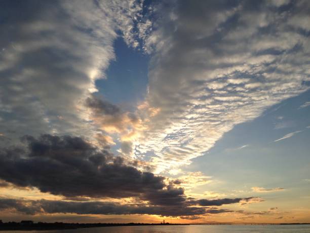istock Big Clouds at Sunset on Fire Island 831849676
