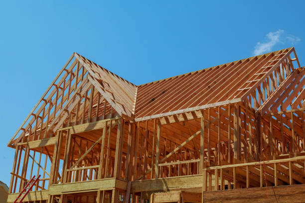 istock wood framework of new residential home under construction. 831854148