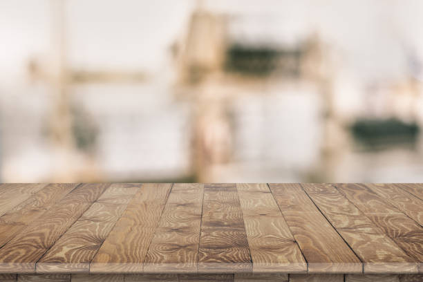 Wooden tabletop perspective for product placement Wooden tabletop perspective for product placement or montage with focus to table. Wooden board surface. brown leg stock pictures, royalty-free photos & images