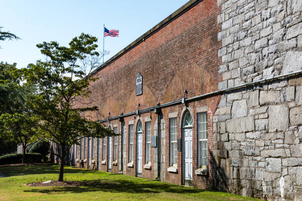 Casemate Museum at Fort Monroe in Hampton, Virginia HAMPTON, VIRGINIA - JULY 9, 2017:  The Casemate Museum at Fort Monroe features the fort's military history, including the room where Jefferson Davis was imprisoned following the American Civil War. hampton virginia photos stock pictures, royalty-free photos & images