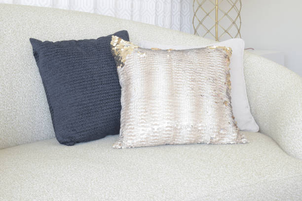 istock Close up pillows on curve sofa in living room 831865398