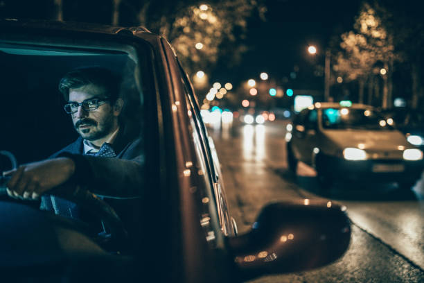 istock Driving a car in city 831865826