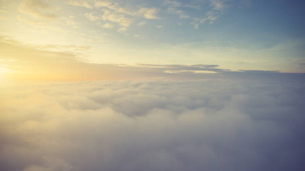 istock Sunny sky abstract background, beautiful cloudscape, on the heaven, view over white fluffy clouds, 831872592