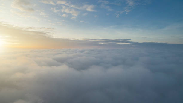 istock Sunny sky abstract background, beautiful cloudscape, on the heaven, view over white fluffy clouds, 831872782