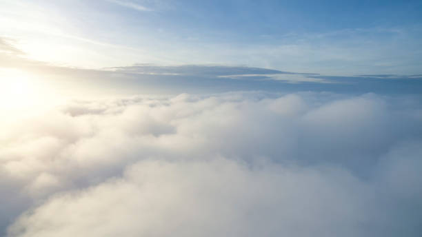 istock Sunny sky abstract background, beautiful cloudscape, on the heaven, view over white fluffy clouds, 831872844