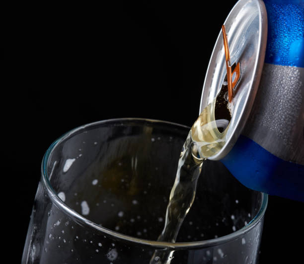 istock Macro of pouring beer from tin can 831884044