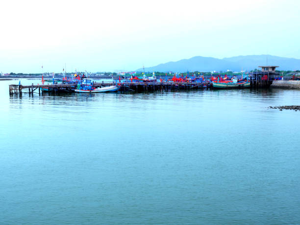 istock Fishing harbor old in thailand 831888970