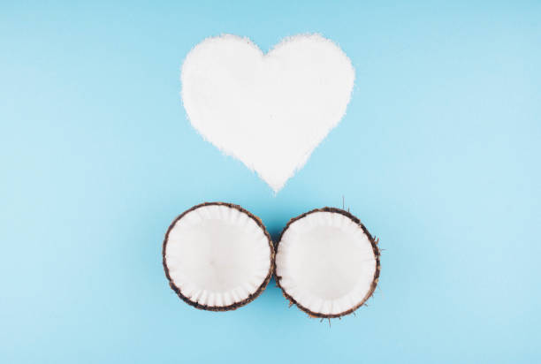 istock Fruits of coconuts on blue background. 831889106
