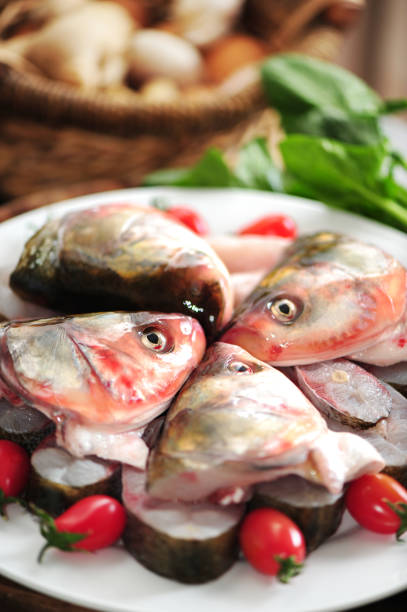 istock Fresh fish is on the white plate 831889408