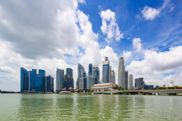 istock modern buildings near bay in singapore. 831896162