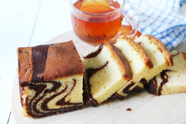 istock Marble cake and cup of black tea 831896300