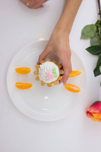 istock cake basket with cream on a plate 831899656