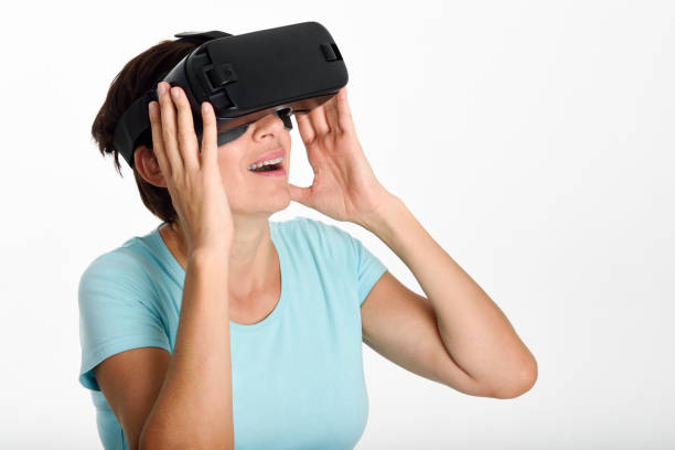 istock Woman looking in VR glasses and gesturing with his hands. 831911704