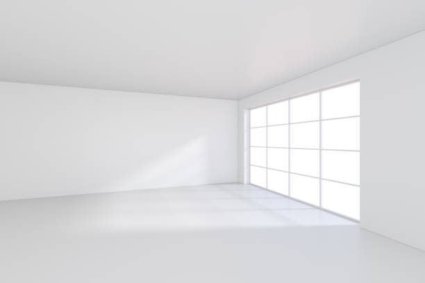istock Large room with windows and falling light from the window to the floor. 3D rendering 831918952