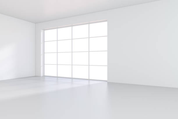 istock large office with windows and falling light from the window to the floor. 3D rendering 831919460