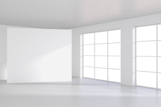 istock White billboard standing near a window in a white room. 3D rendering 831924580