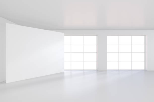 istock White billboard standing near a window in a white room. 3D rendering 831924876