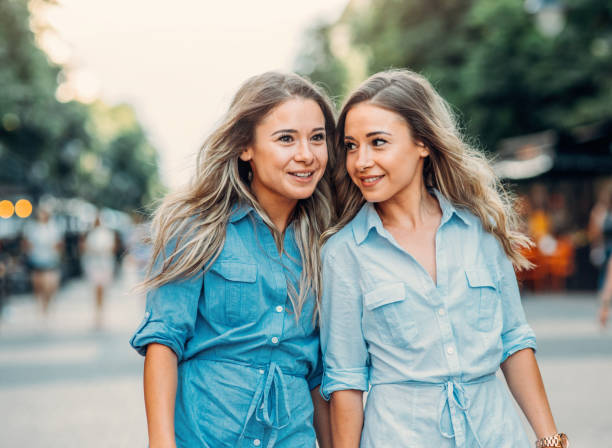 istock Happy twins in the city 831933692