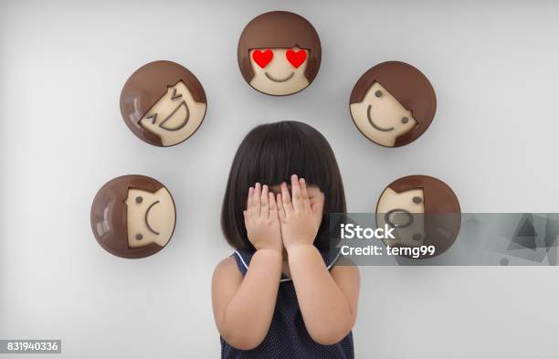 Asian Child Girl With White Background Feelings And Emotions Of Kid Stock Photo - Download Image Now