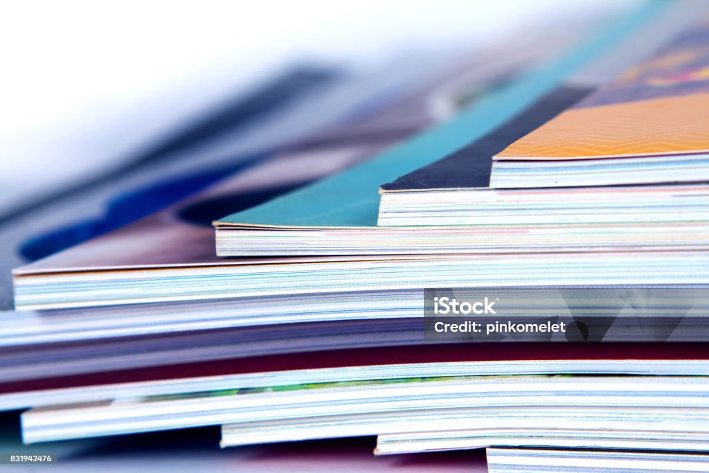 stack of colorful magazines , extreamly DOF stack of the colorful magazines , extreamly DOF Publication Stock Photo