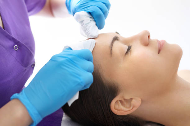 istock Manual facial cleansing. 831954612