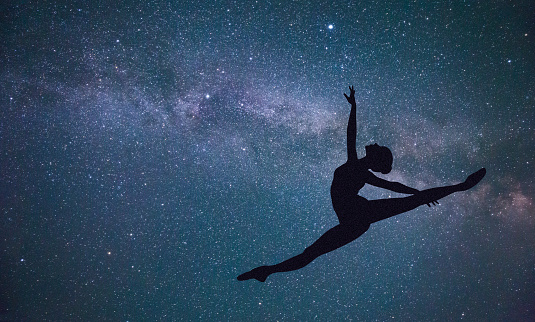 Ballet dancer under the stars