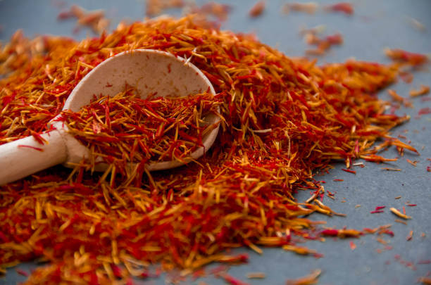 istock Exotic red hot spice, saffron for coloring food. background. isolated 831986208