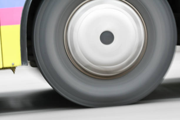 istock Car moving on streets with rolling wheel 831992038
