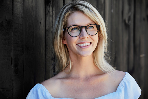 Beautiful woman smiling in glasses