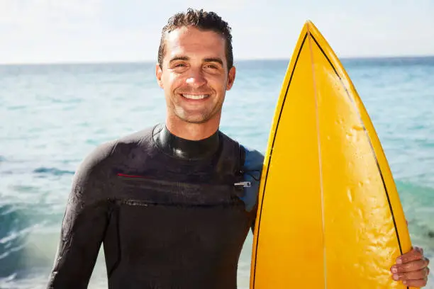 Photo of Smiling surfer dude