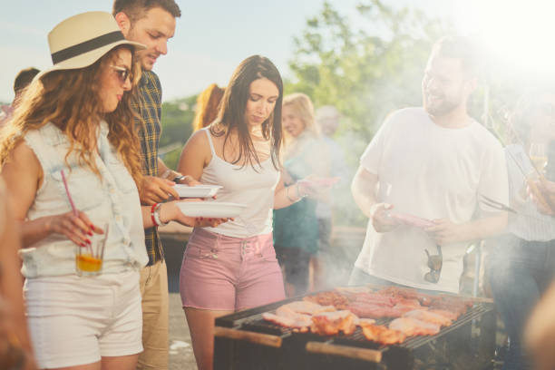 istock Friends having barbecue party 832017878