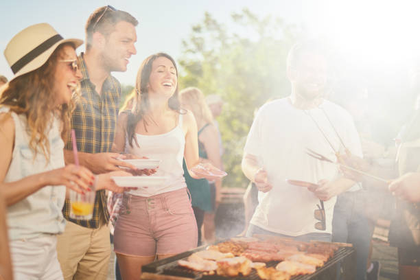 istock Friends having barbecue party 832017904