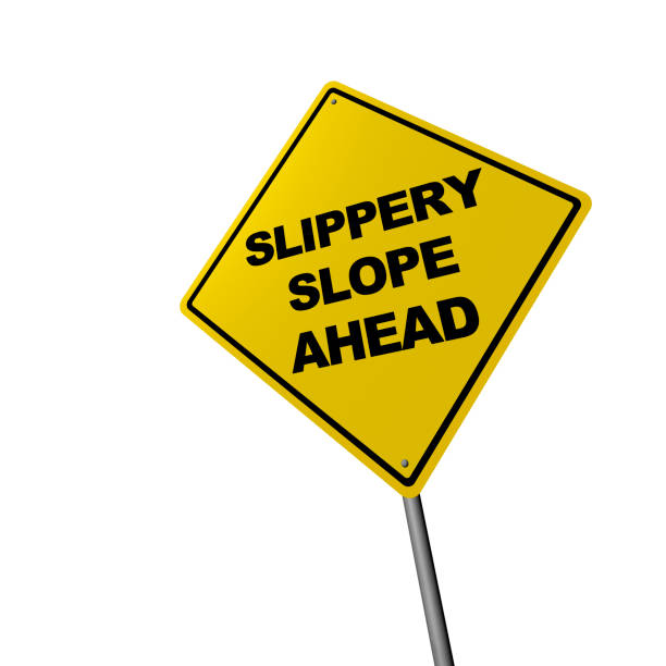 istock SLIPPERY SLOPE AHEAD - Road Warning Sign 832018250