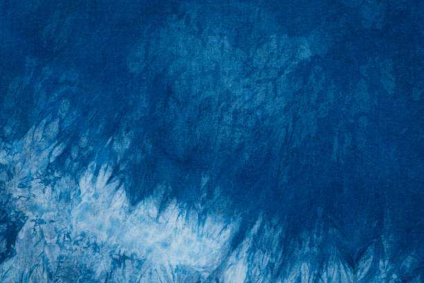 istock Dyed indigo fabric background and textured 832025538