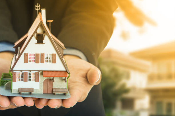 istock New home ,businessman show model house 832027118