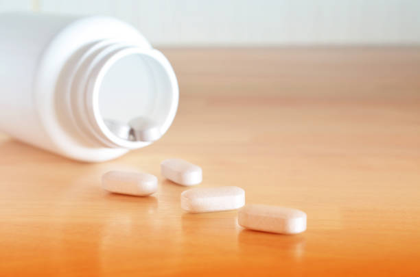 istock White bottle of pills 832040010