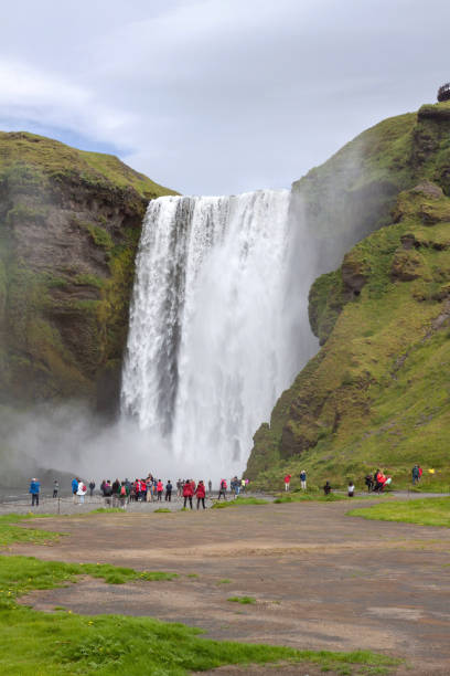 istock Many visitors at Skogafoss, Iceland 832085656