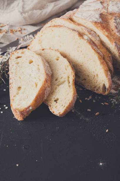 istock Bakery concept. Plenty of sliced bread background 832088462