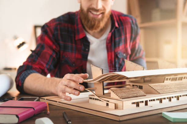 istock Young man architect working in the office ocuupation 832089148