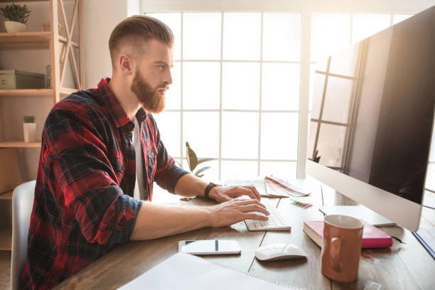 istock Young man architect working in the office ocuupation 832089354