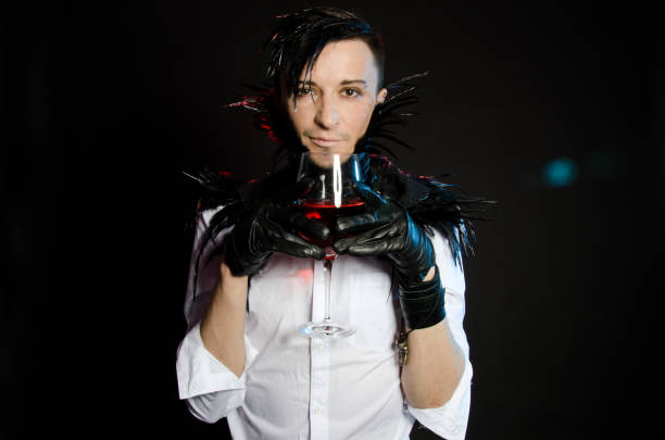 istock A vampire with a glass. Red wine or blood. 832091948