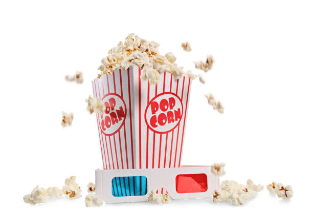 istock Box overflowing with popcorn and a pair of 3D glasses 832092336