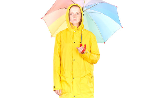 istock Girl in yellow raincoat 832092798