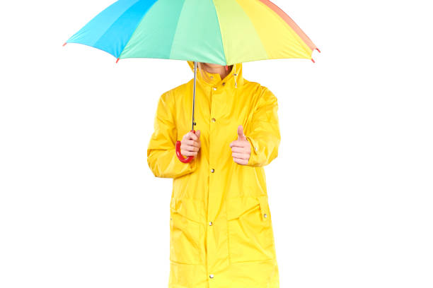 istock Girl in yellow raincoat 832092826